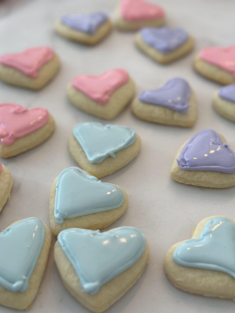 The best sugar cookies decorated in Valentine Day colors of pink, blue and purple